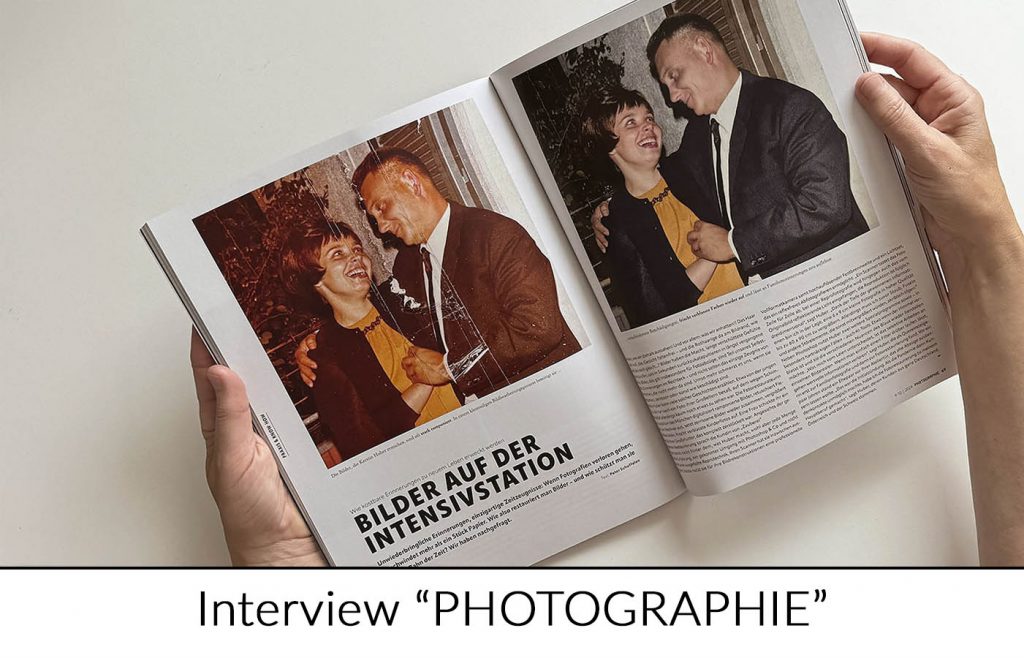 Kerstin Huber mit der Fachzeitschrift PHOTOGRAPHIE, die über ihre Arbeit als Fotorestauratorin berichtet.